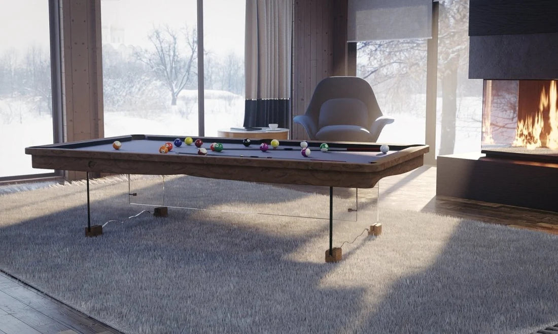 Luxury pool table indoors next to fireplace