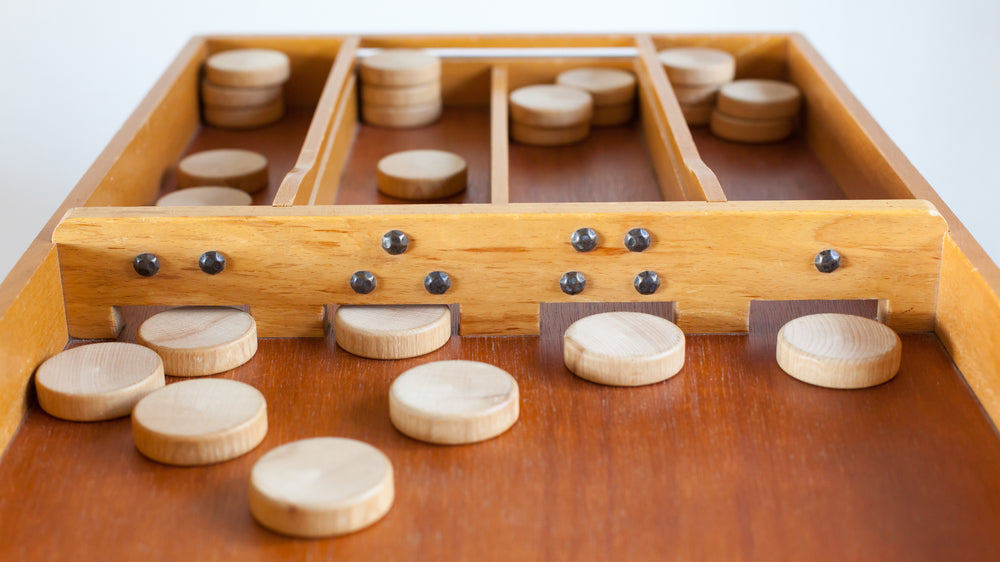 The History and Rules of Sjoelbak or Dutch Shuffleboard